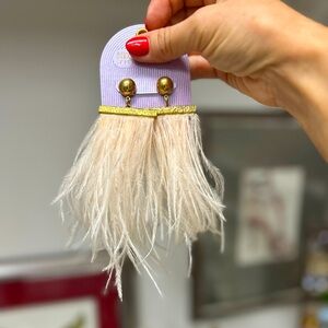 Feather fashion earrings.